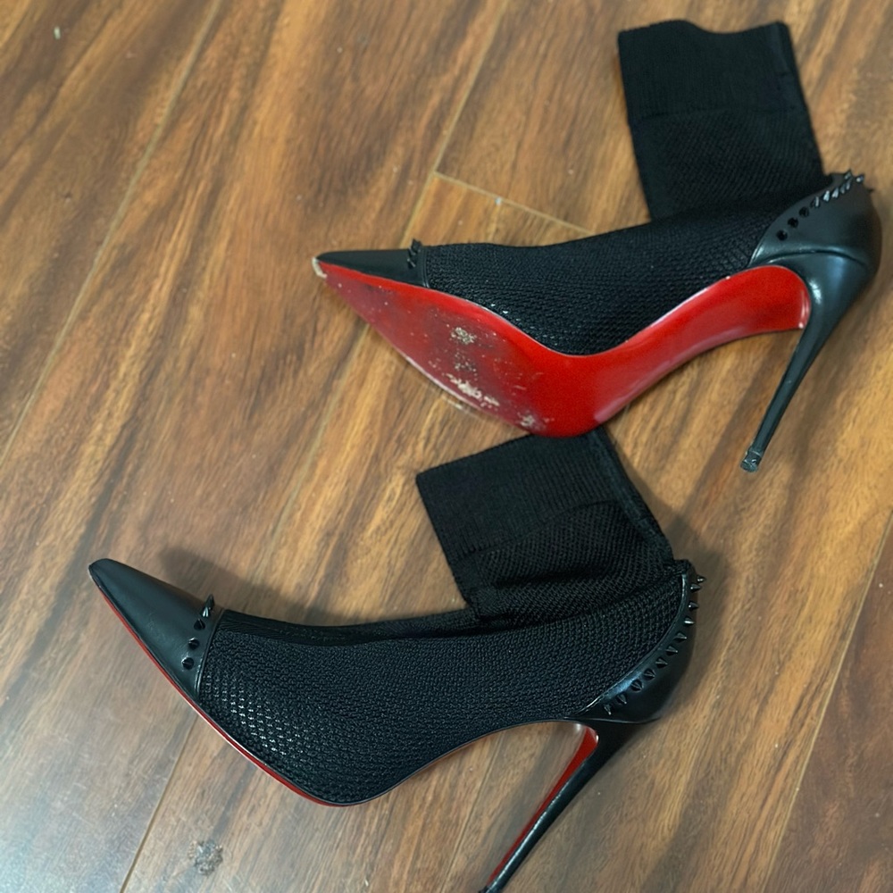 Christian Louboutin Dova studded Leather trim ankle boot.